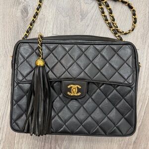 CHANEL Black Quilted Crossbody Bag with Gold Accents